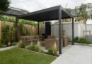 a patio with a couch and a table in it